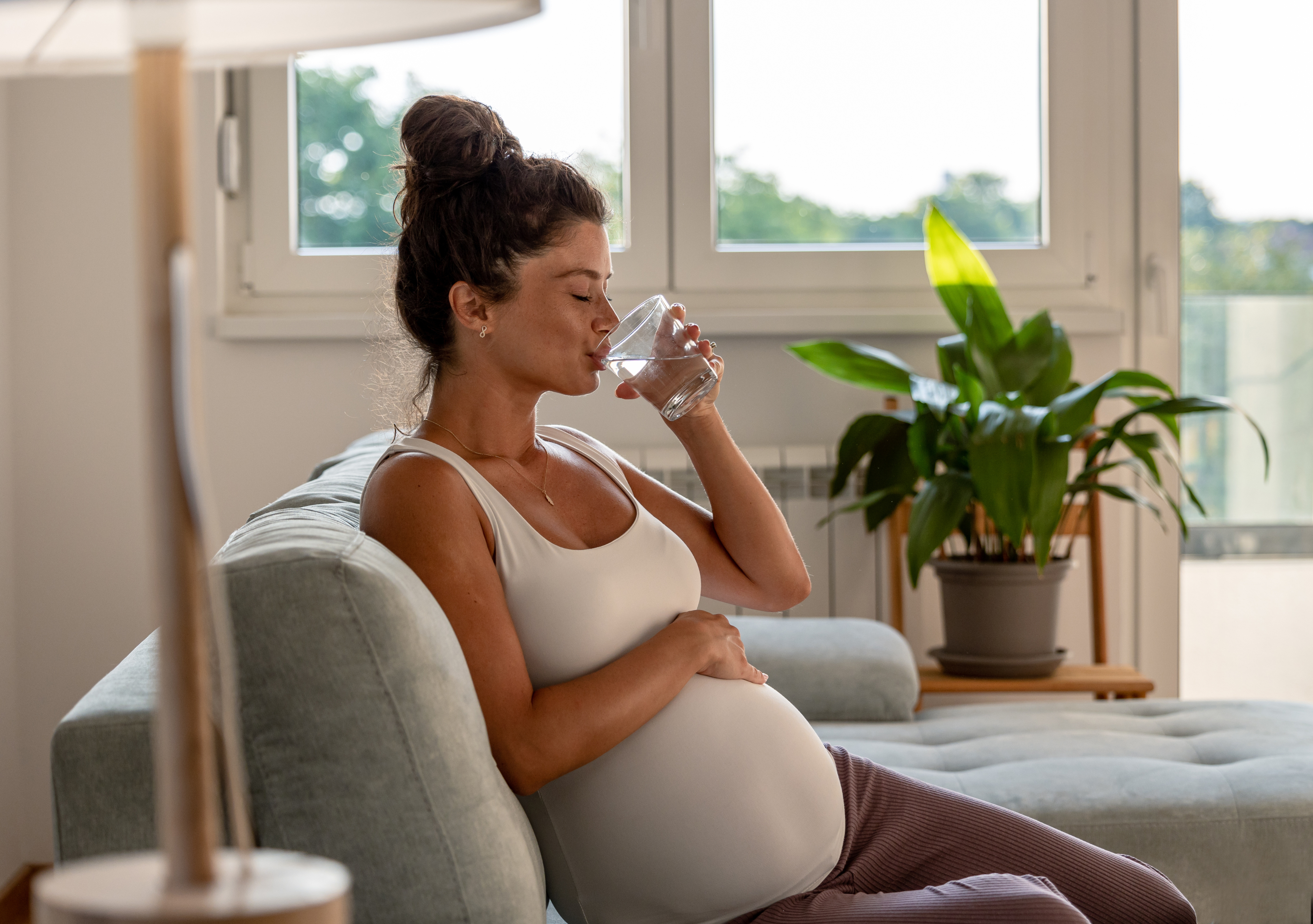 pregnant woman drinking tap water