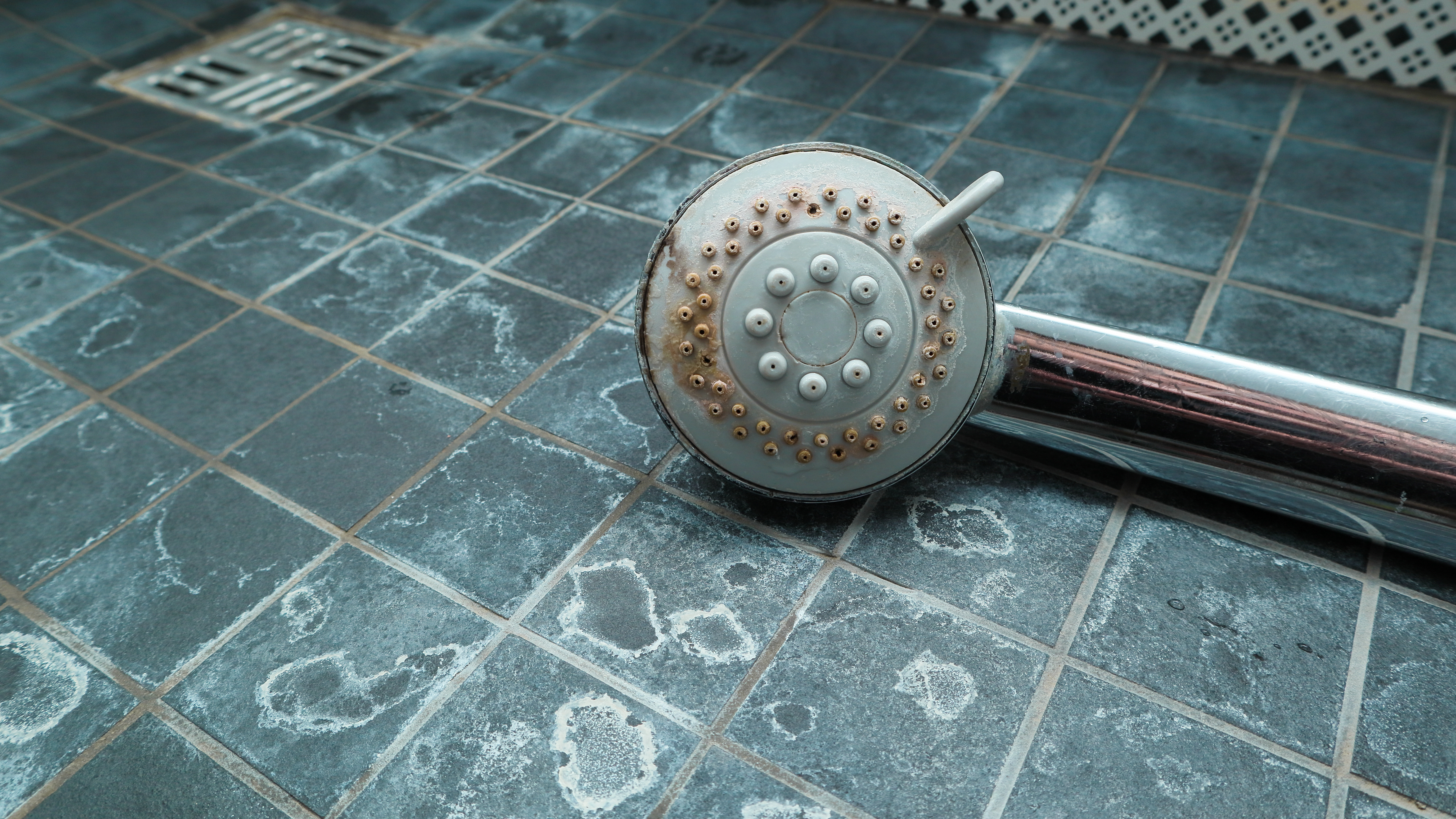 shower faucet with hard water scale