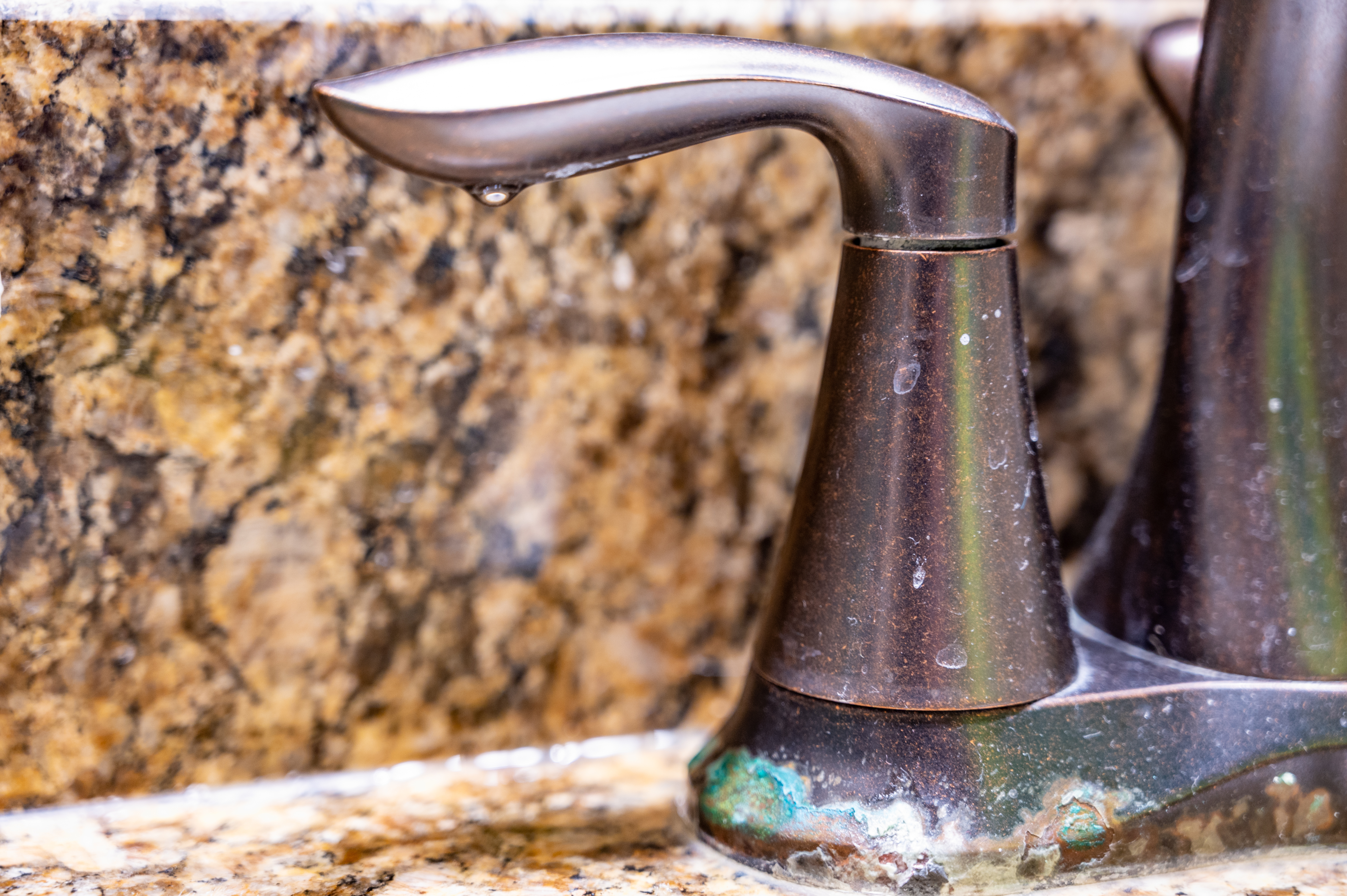 bathroom faucet with hard water scale